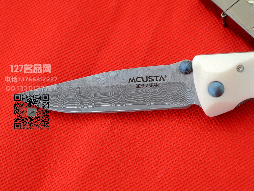 MCUSTA传世家徽 25D梯田纹大马士革钢柄折刀