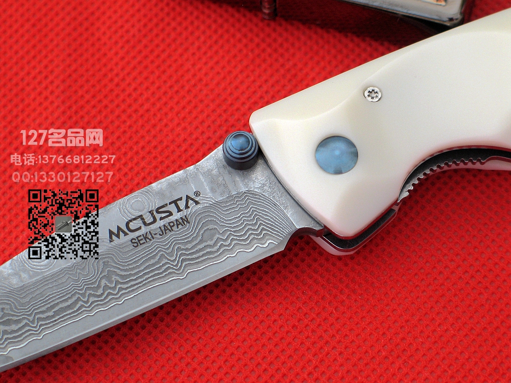 MCUSTA传世家徽 25D梯田纹大马士革钢柄折刀